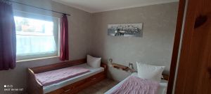 Schlafraum mit 2 Einzelbetten + 1 Auszugsbett