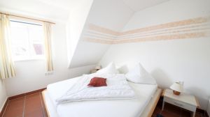 Der Blick in ein Schlafzimmer.