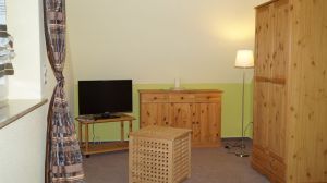 Schlafzimmer mit Fersehecke