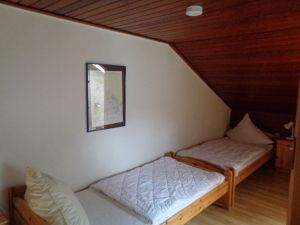 Dreibettzimmer oben Bild 6: Ferienhaus Tilling an der Ostsee